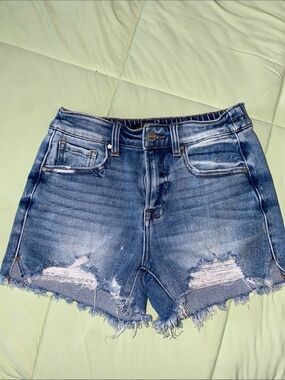 Risen Jeans. Distressed High-Rise Denim Cutoff Shorts in Blue